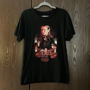 Netflix Stranger Things black top with picture on the front. Size Medium.